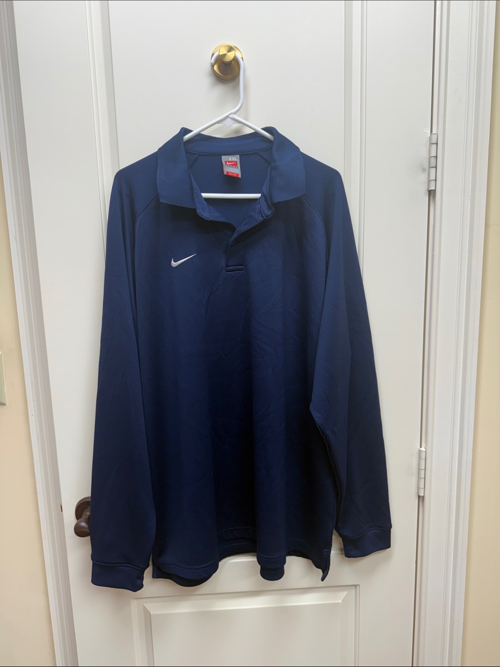 Nike Navy Polo with Red Swoosh Tags